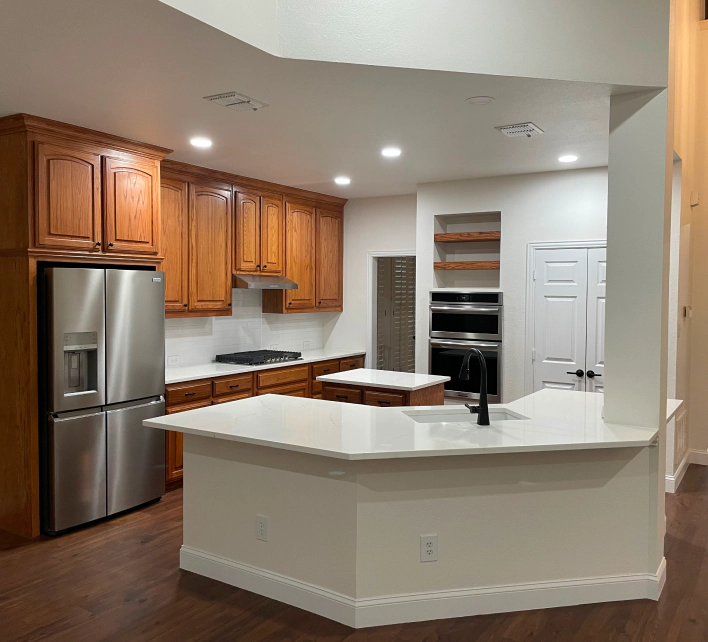 white kitchen with brown cabinets